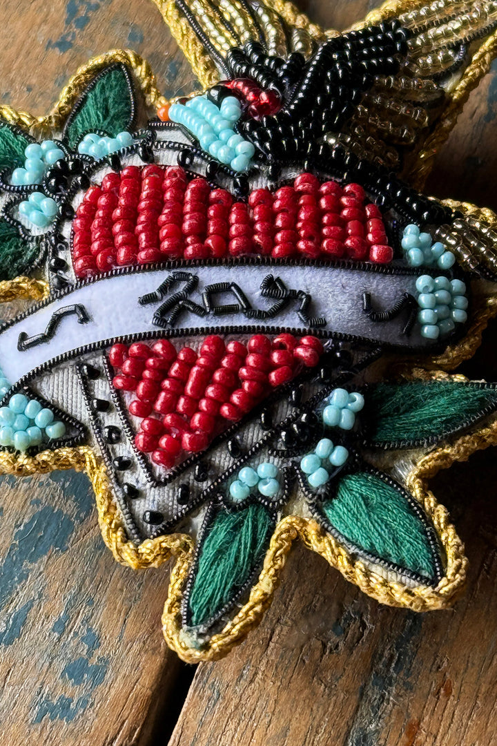 Perlebroderet nøglering "Far"