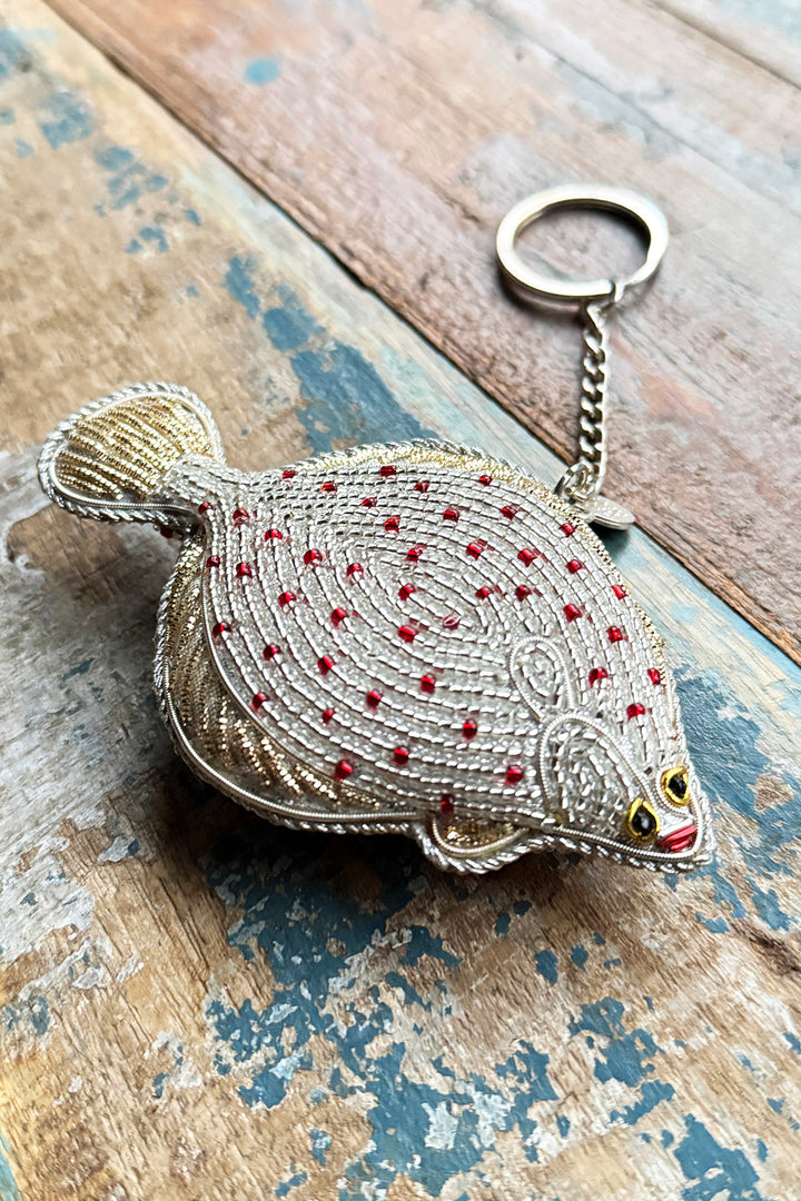 Perlenbestickter Schlüsselanhänger „Specht“