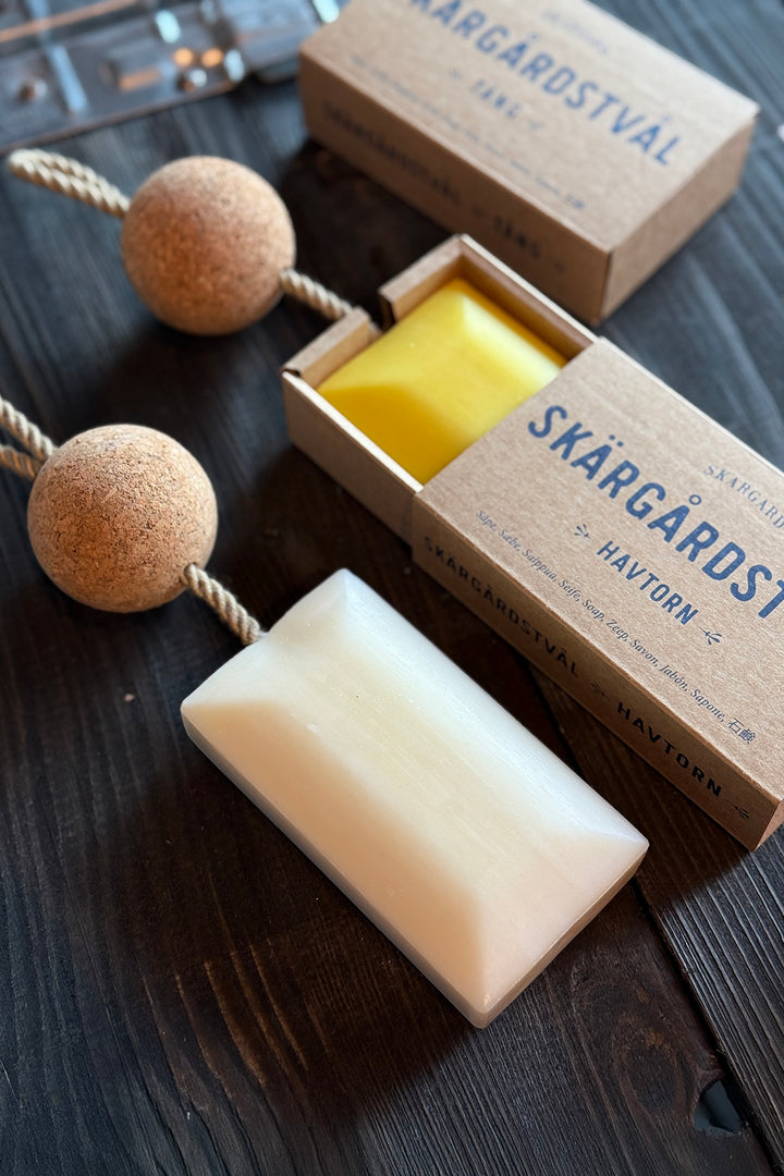 Seife mit Faden und Schwimmer